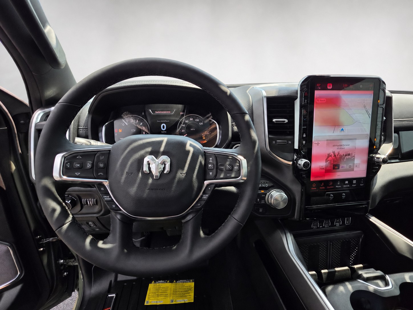 Ram 1500 Laramie Level 2 interior with 14.4 inch screen and Harman Kardon sound